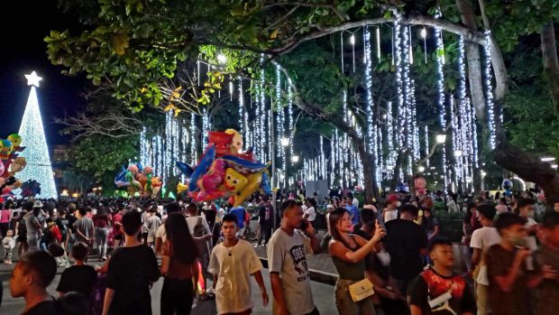 Hundreds of residents gather at the park of Ligao City. STORY: Ligao City lights up 40-feet-tall Christmas tree, park