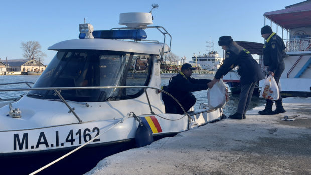 Christmas gifts come by boat to Romanian children in Danube Delta