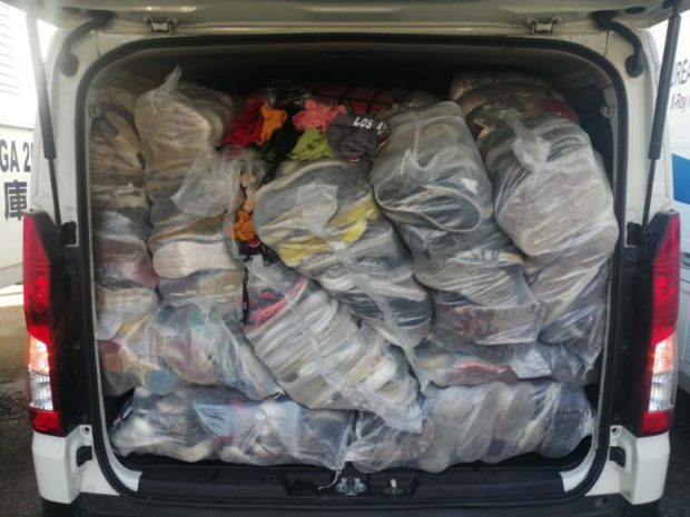 The Philippine coast guard and Bureau of Customs seize P410,000 worth of ukay clothes. Photo from Bureau of Customs.