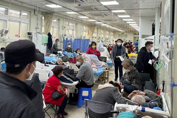 Patients lie on beds in the emergency department of a hospital, amid the coronavirus disease (COVID-19) outbreak in Shanghai, China January 4, 2023. REUTERS/Staff
