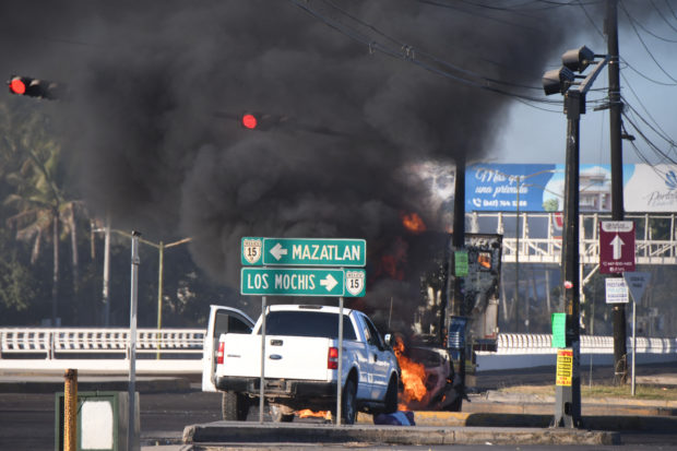 A wave of violence erupts after Mexico captures the son of drug kingpin "El Chapo"