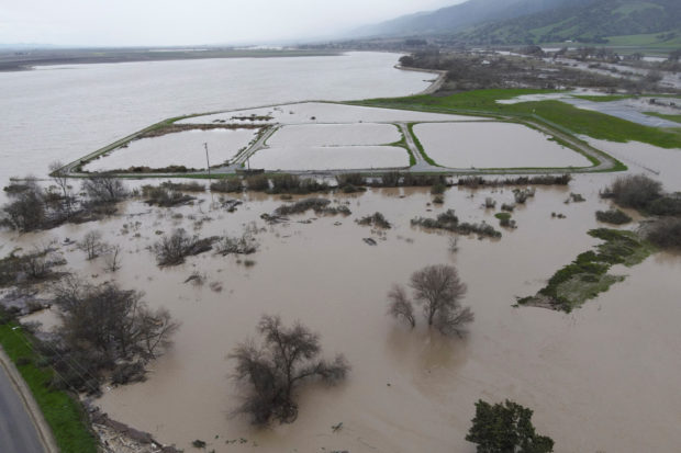 Agricultural land is flooded by the Salinas River in Salinas, California, U.S., January 13, 2023.  REUTERS/David Swanson