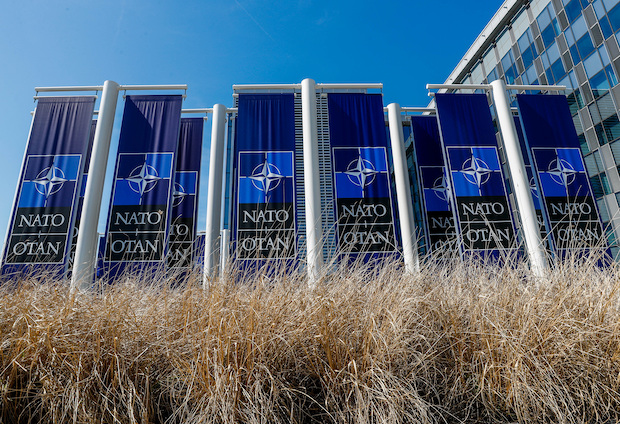 Banners displaying the NATO logo are placed at the entrance of new NATO headquarters during the move to the new building. STORY: Davos 2023: Europe, NATO to build Ukraine unity in Russian no-go zone