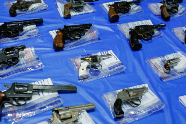 Guns are displayed after a gun buyback event organized by the New York City Police Department (NYPD), in the Queens borough of New York City, U.S., June 12, 2021. REUTERS/Eduardo Munoz/File Photo