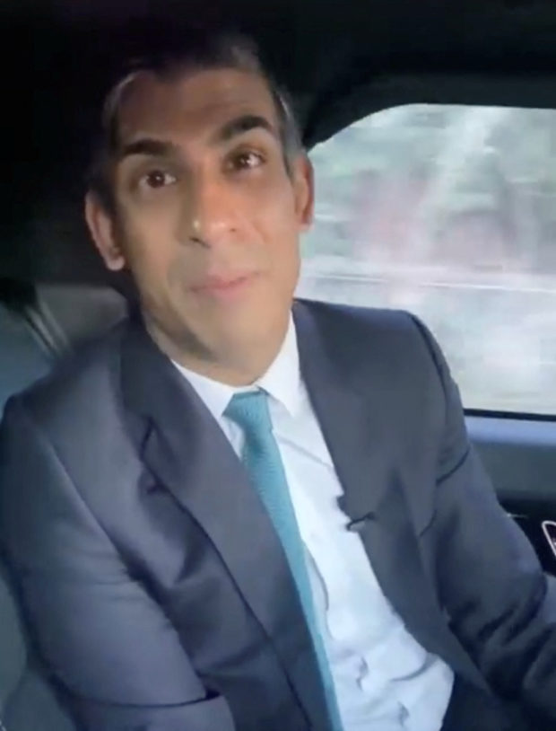 FILE PHOTO: British Prime Minister Rishi Sunak appears to not be wearing his seat belt, in an unknown location in England, Britain in this screen grab taken from a social media video on January 19, 2023. Rishi Sunak via Instagram/via REUTERS/File Photo