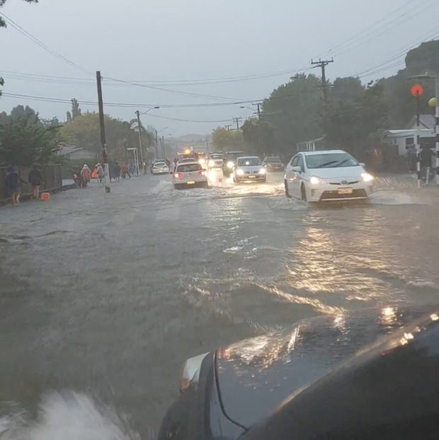 A general view of a flooded street after Elton John?s concert was canceled due to bad weather, in Auckland, New Zealand, January 27, 2023 in this screen grab obtained from a social media video. Duane Moyle/via REUTERS