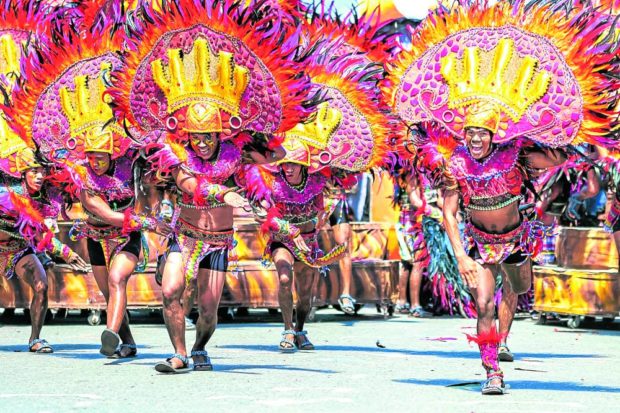 Ati tribes compete in the street-dancing contest in previous celebrations of Iloilo’s Dinagyang Festival.