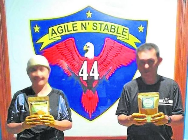 Two former NPA fighters present the so-called rebels’ brew, their “secret drink”