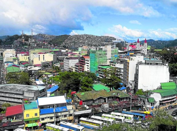 FRIENDLY NEIGHBOR   Baguio City, designed and built more than a century ago by the American colonial government, has become a finance and trade hub in this part of the country. Now overcrowded, it has been promoting neighboring Benguet towns as new investment sites. —EV ESPIRITU