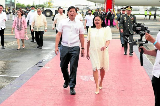 President Marcos and first lady Liza Araneta-Marcos arrive at Villamor Air Base in Pasay City on Saturday afternoon from his weeklong participation in the World Economic Forum meetings in Davos, Switzerland. STORY: We’re working to customize Maharlika – Bongbong Marcos