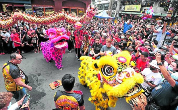 Revelers taking part in the Chinese New Year celebrations in the Manila district of Binondo. FOR STORY: PNP to deploy over 1,400 cops for Chinese New Year festivities in Manila