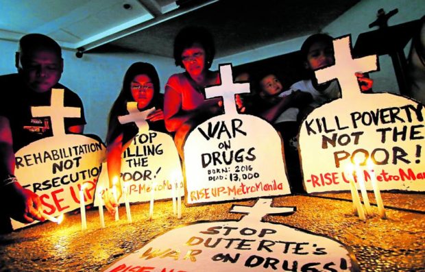 Protest vs drug war. Tomb-like placards. STORY: Next move for victims’ kin: Ask ICC to summon Duterte