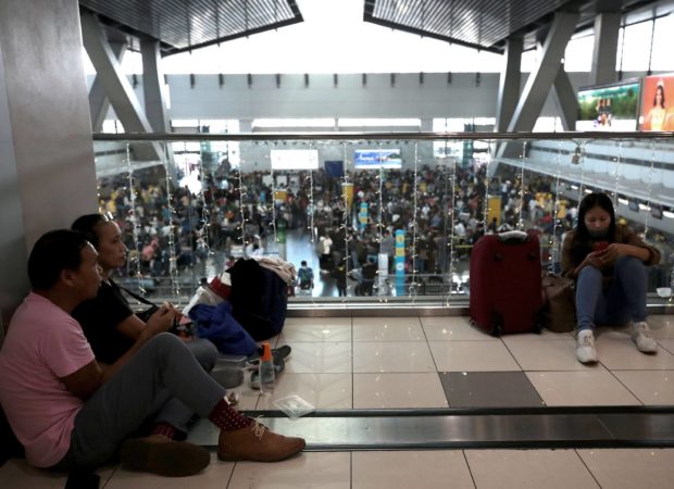 Passengers at NAIA Terminal 3. STORY: Senators seek thorough probe of Naia fiasco