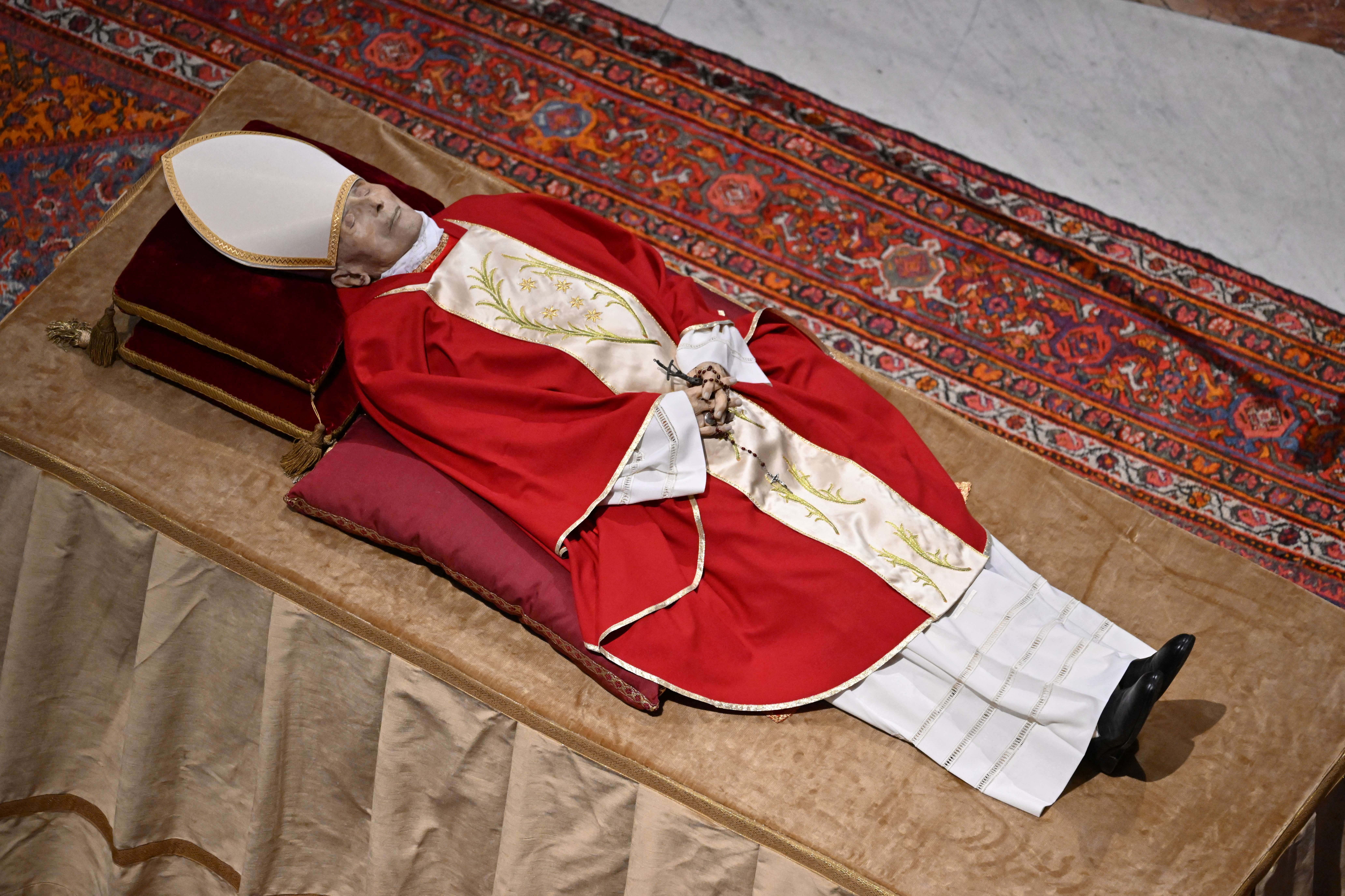 The story behind Pope Benedict XVI's red shoes