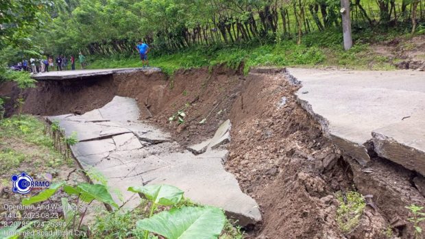 A road in Ubaldo Laya village, Iligan City was damaged by a landslide due to heavy rains on Thursday.