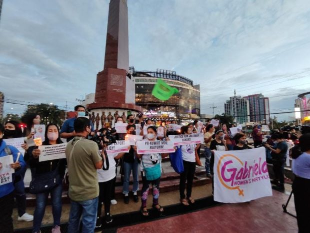 Members of the Gabriela party hold a vigil in Quezon City.  