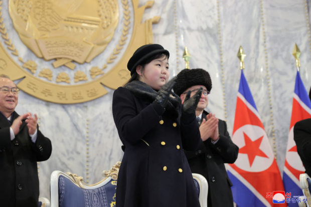 Kim Ju Ae, daughter of North Korean leader Kim Jong Un, attends a military parade to mark the 75th founding anniversary of North Korea's army, at Kim Il Sung Square in Pyongyang, North Korea February 8, 2023, in this photo released by North Korea's Korean Central News Agency (KCNA).    KCNA via REUTERS