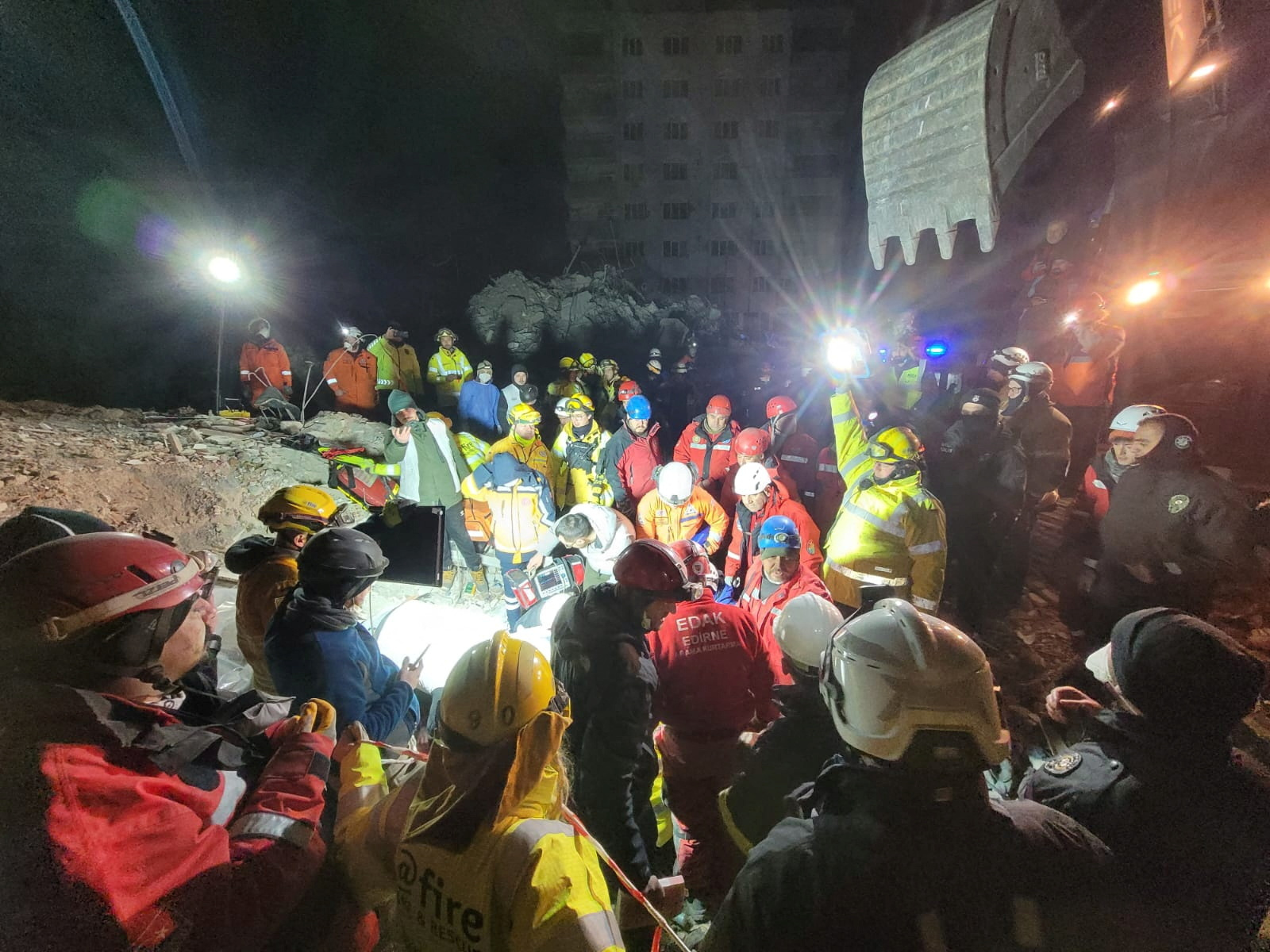 Rescue workers try to rescue a 15-year-old girl trapped under the rubble, in the aftermath of a deadly earthquake in Kahramanmaras, Turkey February 10, 2023. @fire - Internationaler Katastrophenschutz/Handout via REUTERS turkey syria quake rescue