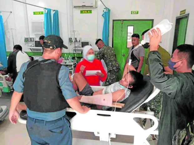 EMERGENCY TREATMENT Medical staff of a hospital in Parang, Maguindanao del Norte, attend to wounded Marine soldiers on Saturday who were ambushed by suspected Dawlah Islamiyah-Maute terror group in the nearby Marogong, Lanao del Sur, at 3:45 p.m. of the same day. —PHOTO COURTESY OF THE MAROGONG MUNICIPAL POLICE STATION