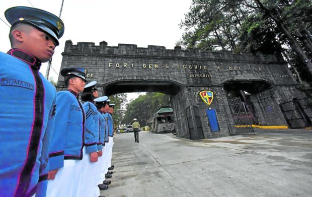 The Philippine Military Academy, its main entrance shown in this 2019 photo, has gone to court to preserve its military reservation in Baguio City from settlers. STORY: 2 farmers get 10 days in jail for encroaching on PMA land
