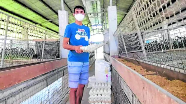 Ver San Pedro, chair of Barangay Lugam in the City of Malolos, shows off the eggs produced in his poultry farm in this November 2021 photo. Commercial and backyard farms in Bulacan province are cautioned against the possible bird flu infection after the type A subtype H5N1 strain of the disease was detected in Sta. Maria town. STORY: Bulacan moves to protect poultry farms from bird flu