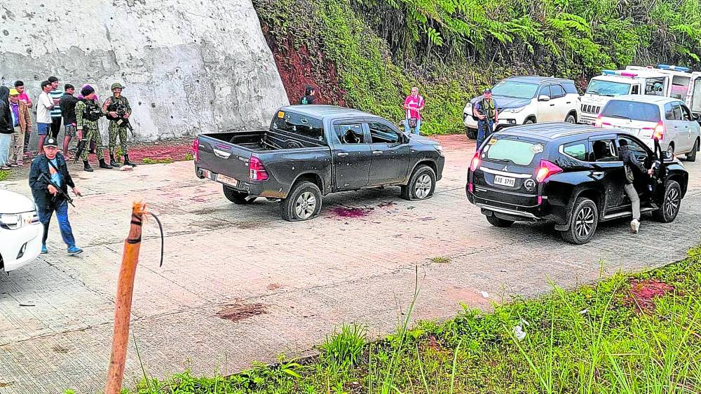 The bullet-riddled pickup of Lanao del Sur Gov. Mamintal Adiong Jr. is left on the highway in Maguing town after the ambush on Feb. 17 that wounded the governor
