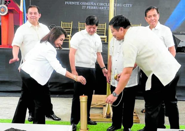 NOW IT BEGINS President Marcos (third from left) leads the groundbreaking ceremony for the Cebu Bus Rapid Transit (BRT), the country's first BRT system planned in the 1990s,  at the Fuente Osmeña Circle in uptown Cebu City on Monday. With him are House Speaker Ferdinand Martin Romualdez (left), Cebu Gov. Gwendolyn Garcia (second from left), and Cebu City Mayor Michael Rama (right). PHOTO COURTESY OF SUGBO NEWS