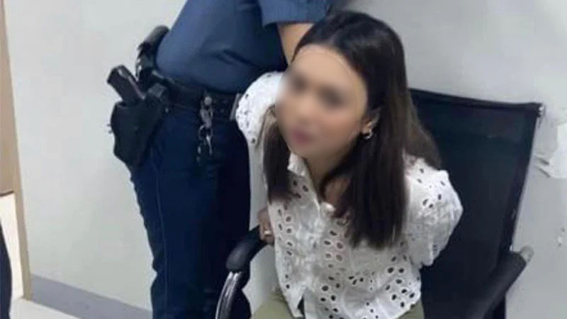 Mikaela Veronica Cabrera during her arrest in Taguig City