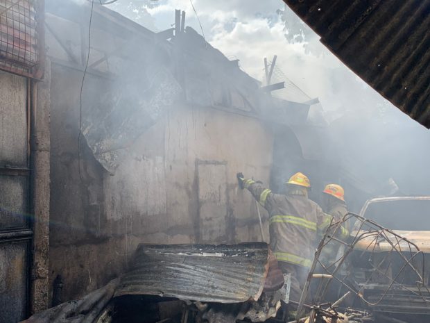LOOK: Fire hits fuel retail store in Caloocan City | Inquirer News