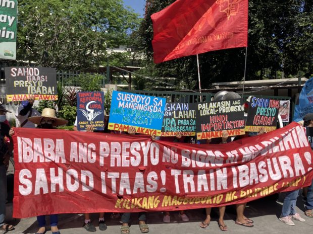 Different groups mobilize in front of the Department of Agriculture in Quezon City to decry the Rice Liberalization Law on its fourth anniversary on Tuesday, February 14, 2023. 