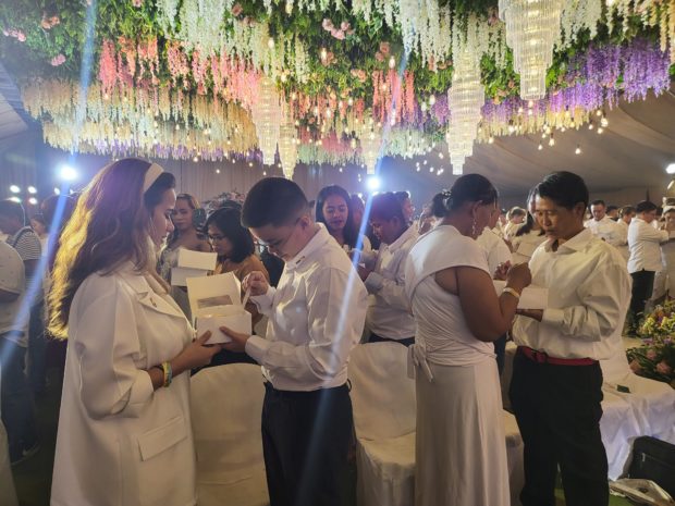   LGBTQ+ couples take part in a Valentine's Day commitment ceremony in Quezon City. (Photo from Mayor Joy Belmonte’s Twitter page)