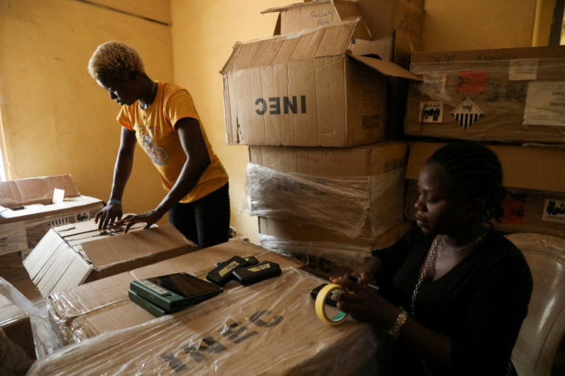 Employees sort electoral material at Independent National Electoral Commission (INEC) office, ahead of Nigeria's Presidential election in Anaocha, Anambra state