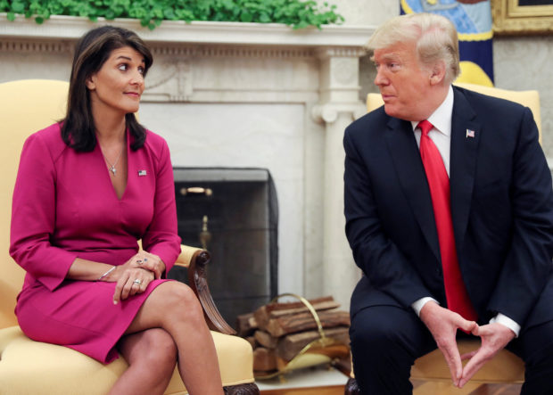 FILE PHOTO: U.S. President Trump meets with U.N. Ambassador Haley in the Oval Office of the White House in Washington