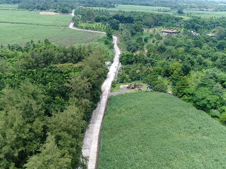 The Department of Public Works and Highways completes the final phase of an access road reconstruction to support the agri-tourism industry in Talisay City, Negros Occidental