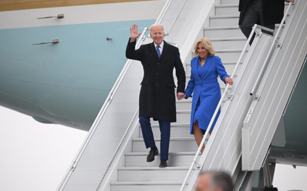 US President Joe Biden and First Lady Jill Biden step off Air Force One upon arrival at Ottawa International Airport in Ottawa, Canada on March 23, 2023. (Photo by Mandel NGAN / AFP)