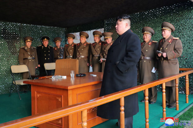 North Korean leader Kim Jong Un watches fire assault drill, at an undisclosed location in North Korea March 10, 2023 in this photo released by North Korea's Korean Central News Agency (KCNA). KCNA via REUTERS
