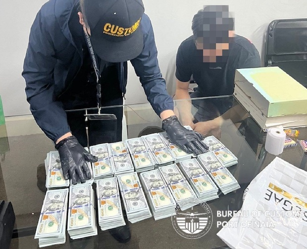 Korean with undeclared cash STORY: Korean nabbed at NAIA for trying to sneak in over P9 million in cash