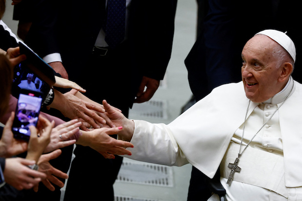 Pope Francis meets with Rho's parishes faithful at Vatican. STORY: Pope extends sexual abuse law to include lay leaders