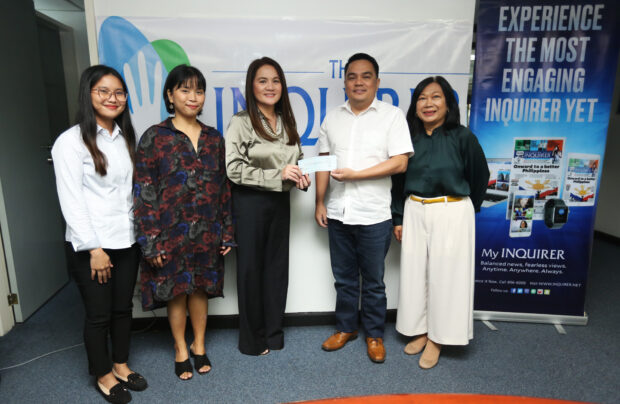Present during the turnover of the Noel Bazaar donation are (from left) Cut Unlimited Inc. special event and admin staff Joy Buella, digital marketing specialist Aien Lemence, president Mayose Gozon-Bautista, Philippine Daily Inquirer's president and CEO, Rudyard Arbolado, and Inquirer Foundation executive director Connie Kalagayan.