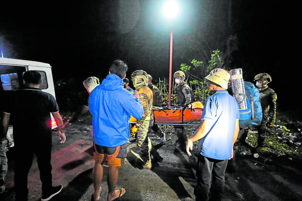  A team tasked to retrieve the remains of the four victims of the Feb. 18 plane crash from the slopes of Mayon Volcano 