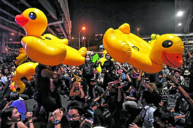 Antigovernment protesters in Thailand have adopted yellow inflatable ducks as their mascot, in this photo taken in Bangkok. STORY: Thai man jailed for rubber duck calendar royal insult