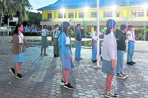 A March 6 photo shows high school studentsgathering for the roll call on campus early in the morning in Kupang, capital of Indonesia’s East Nusa Tenggara province. 