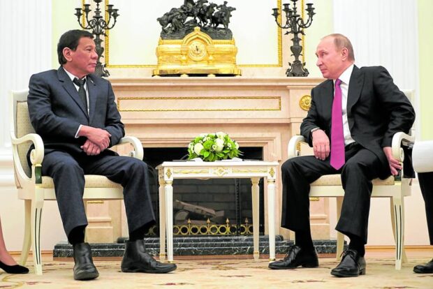 Former President Rodrigo Duterte once called Russian President Vladimir Putin “a personal friend.” They meet here at the Kremlin during the Philippine leader’s visit to Moscow on May 23, 2017.