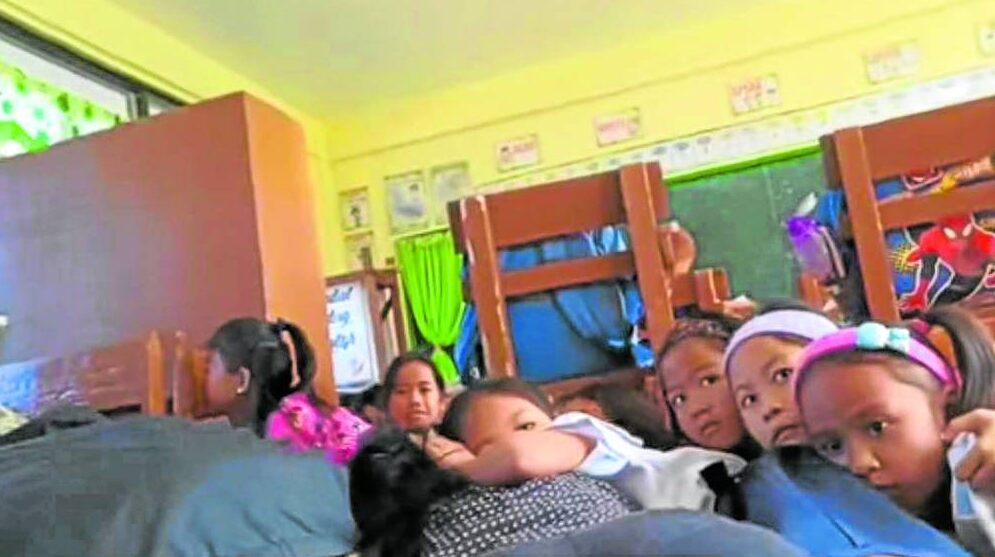 Pupils cower in fear in one of the schools in Masbate province where fighting erupted within earshot on Wednesday between government troops and New People’s Army rebels. Some schools in the towns of Dimasalang, Placer, Cawayan, Esperanza, Cataingan and Uson suspended in-person classes due to the encounters.