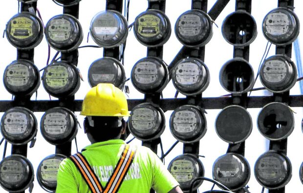 A lineman inspects electric meters in Metro Manila as the country continues to suffer from inequities in the country’s power industry. —STORY: Senator hits power oversupply contracts