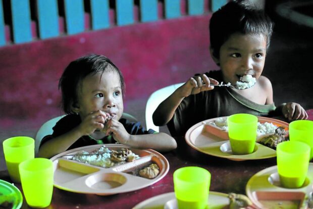 Children in a feeding program. STORY: PH borrows P10 billion for malnutrition reduction program