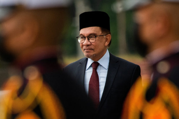 Malaysian Prime Minister Anwar Ibrahim attends a wreath-laying ceremony at Rizal Park, in Manila, Philippines, March 2, 2023. REUTERS/Lisa Marie David