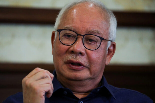 FILE PHOTO: Malaysia's former Prime Minister Najib Razak speaks during an interview with Reuters in Kuala Lumpur