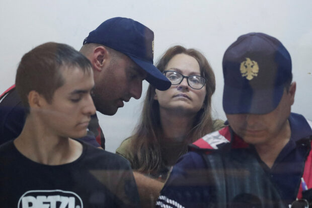 FILE PHOTO: Russians Mikahil Zorin and Svetlana Timofeeva attend a preliminary session for the cautionary sentence after being arrested for violating a military facility, in Elbasan