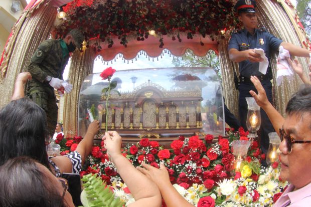 Devotees flock to Saint James the Great Parish in Tanjay City, Negros Oriental to pay respects to the relic of St. Therese of the Child Jesus on Monday, March 6, 2023 (FERDINAND EDRALIN)
